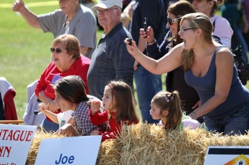 spectators yelling at soapbox races